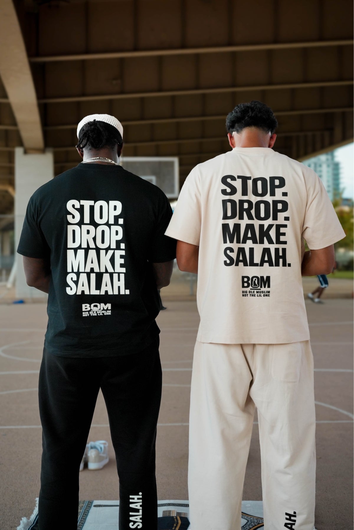 Stop Drop Make Salah tees in black and cream, back prints
